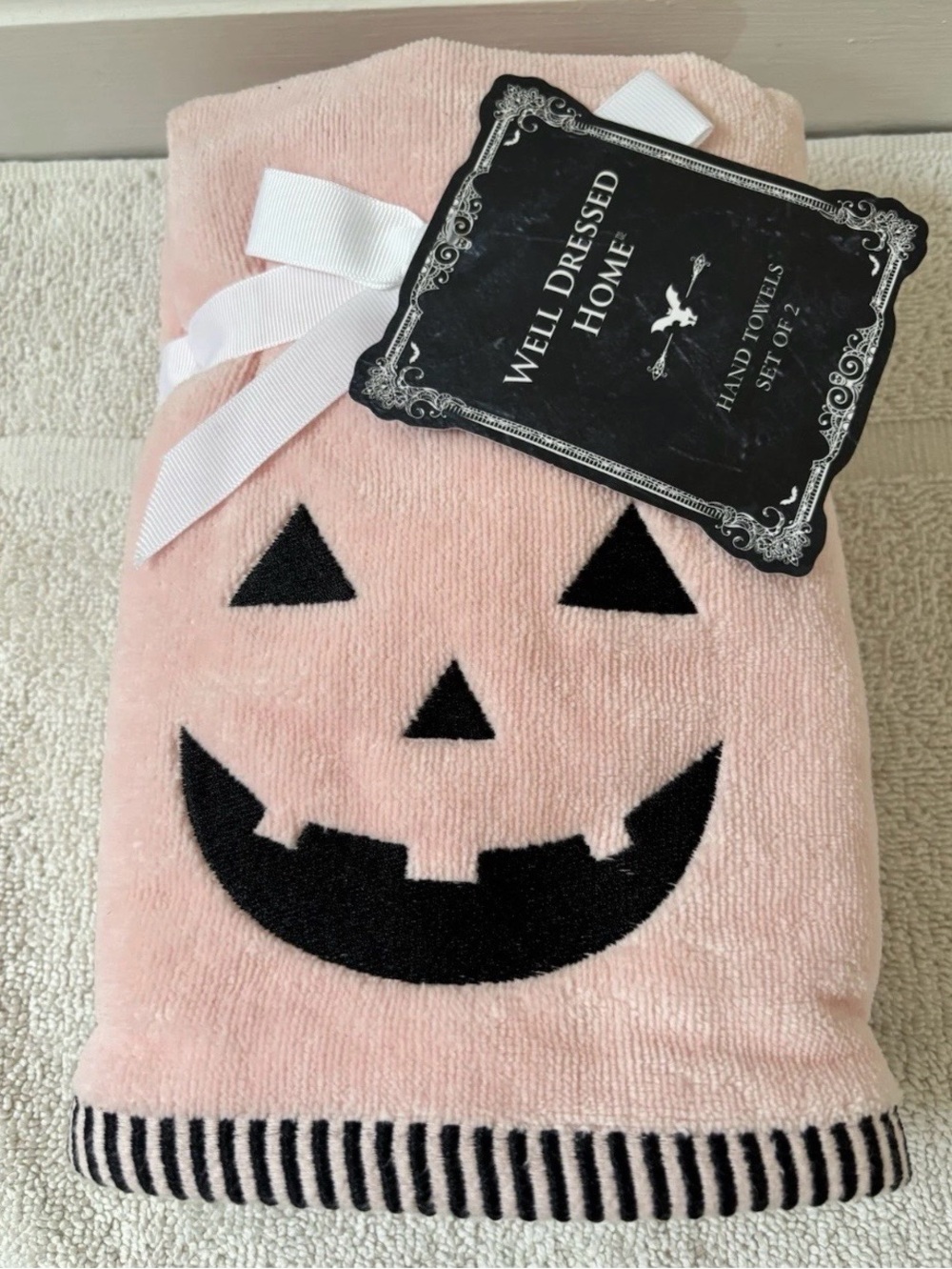 Well Dressed Home 2Pk. Pumpkin Face Hand towels Pink & Black